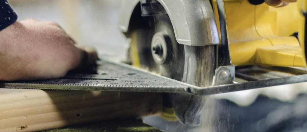 carpenter cutting wood