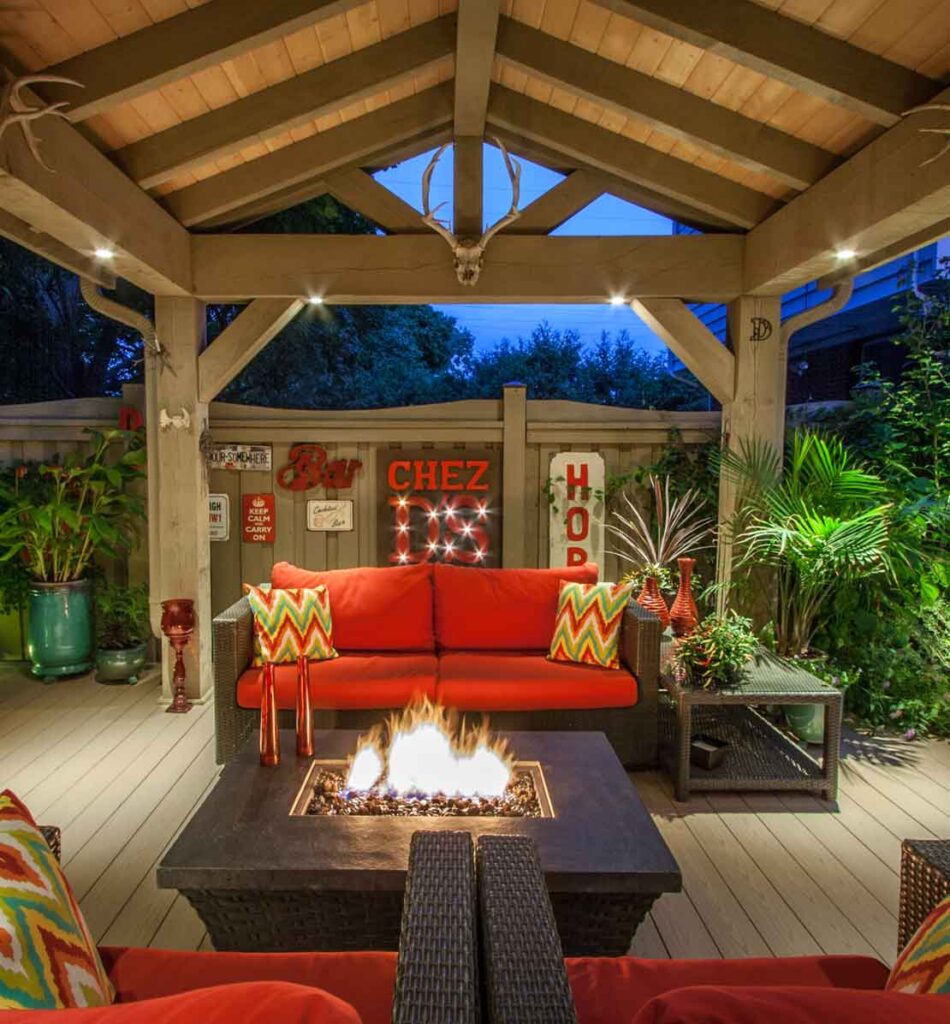 propane fire table under a gazebo at night