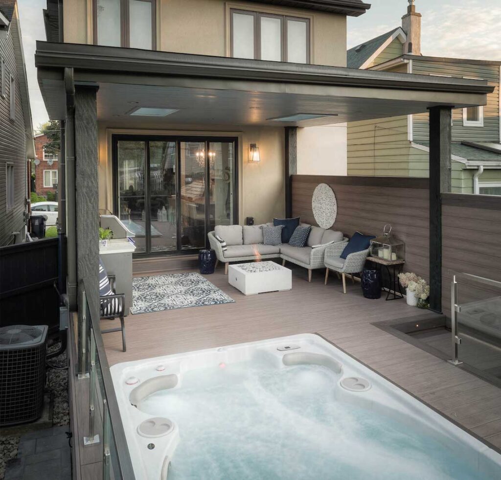 toronto deck with a roof and swim spa design with landscaping