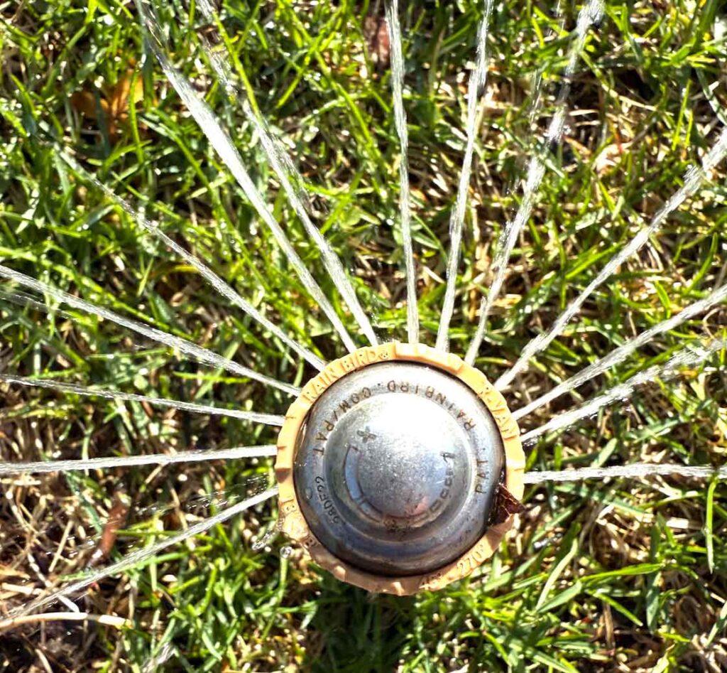 rotary nozzle irrigation for more efficient watering front and back yards