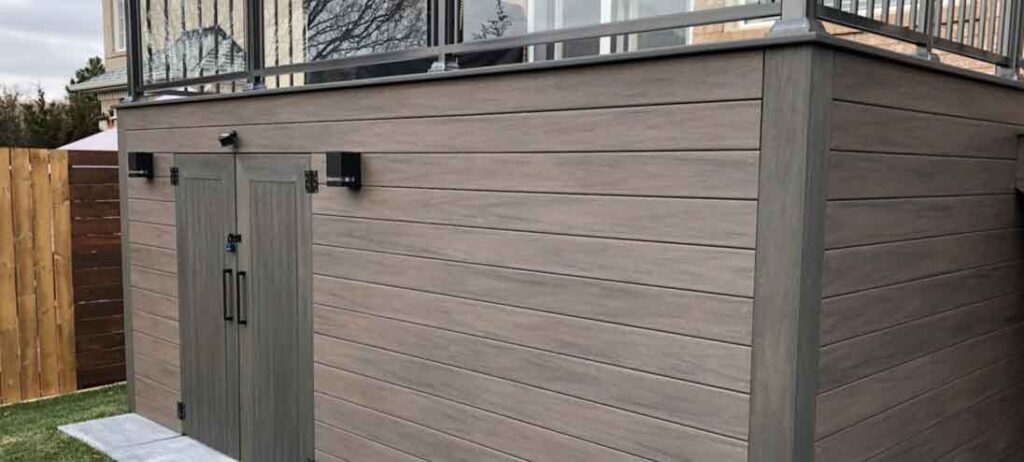 Elevated deck offering concealed storage space below for a clutter-free backyard